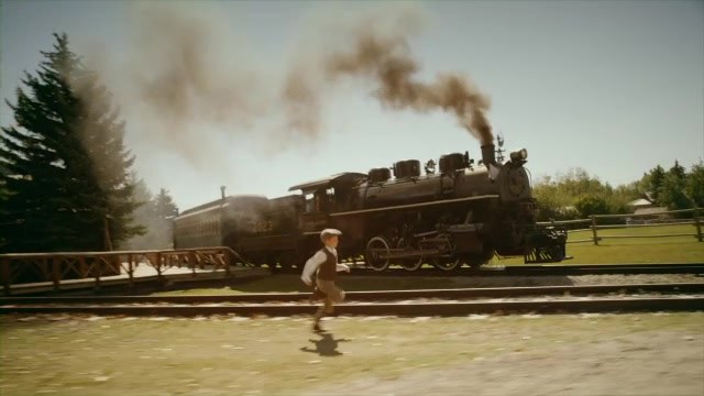 Tourism Alberta — kid racing the steam train at Heritage Park, art direction by Rader Turner